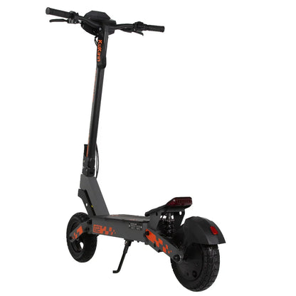 Black and orange electric scooter with fat tires and suspension, ideal for urban commuting and off-road paths.