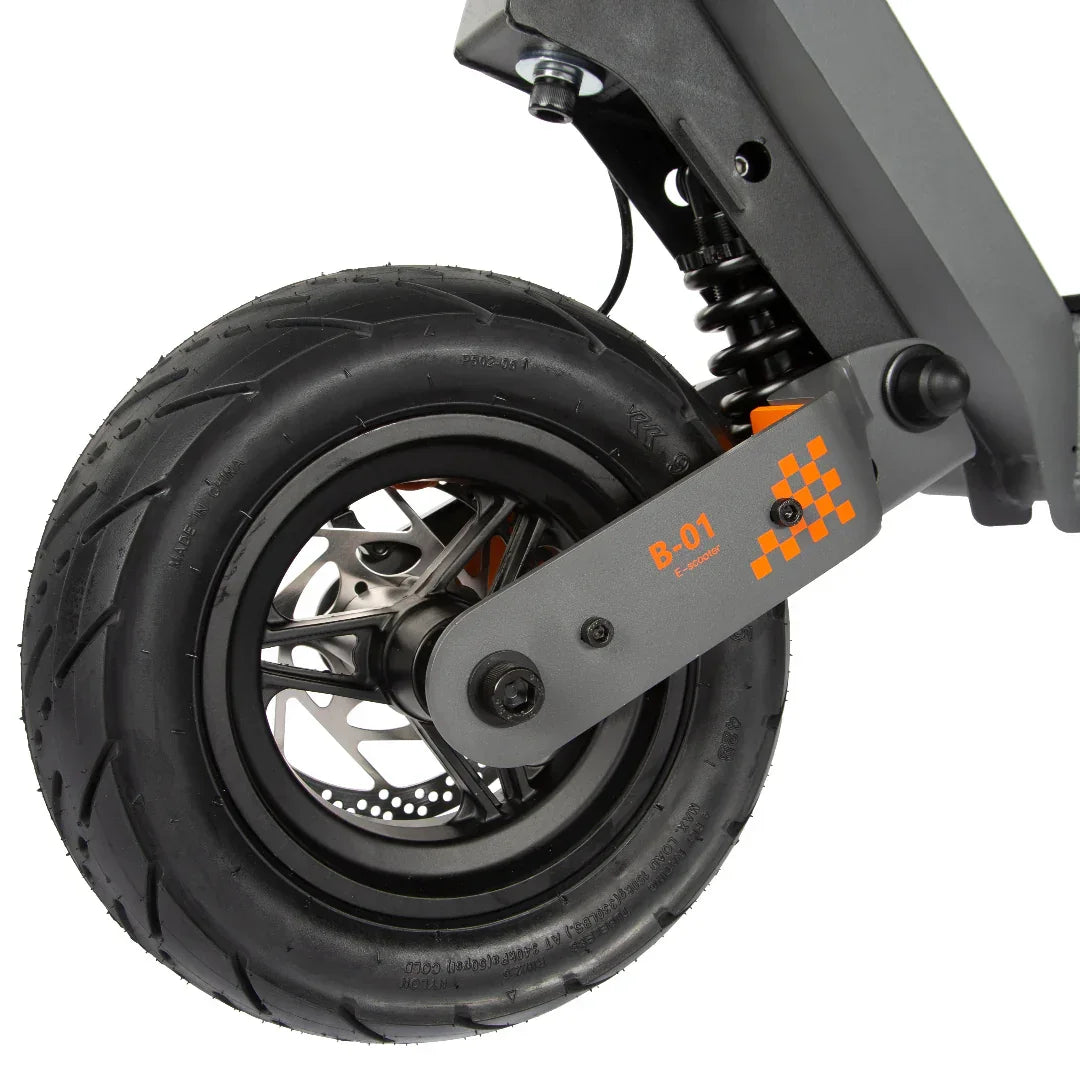 B-01 e-scooter front wheel with suspension and disc brake, rugged tire tread detail
