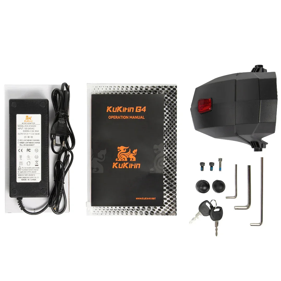 KuKirin G4 electric bike motor kit with charger, manual, keys, and mounting hardware